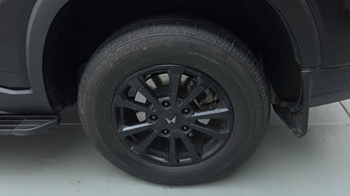 Used 2025 Mahindra Scorpio N Z8 Petrol MT 7 STR Petrol Manual tyres LEFT REAR TYRE RIM VIEW