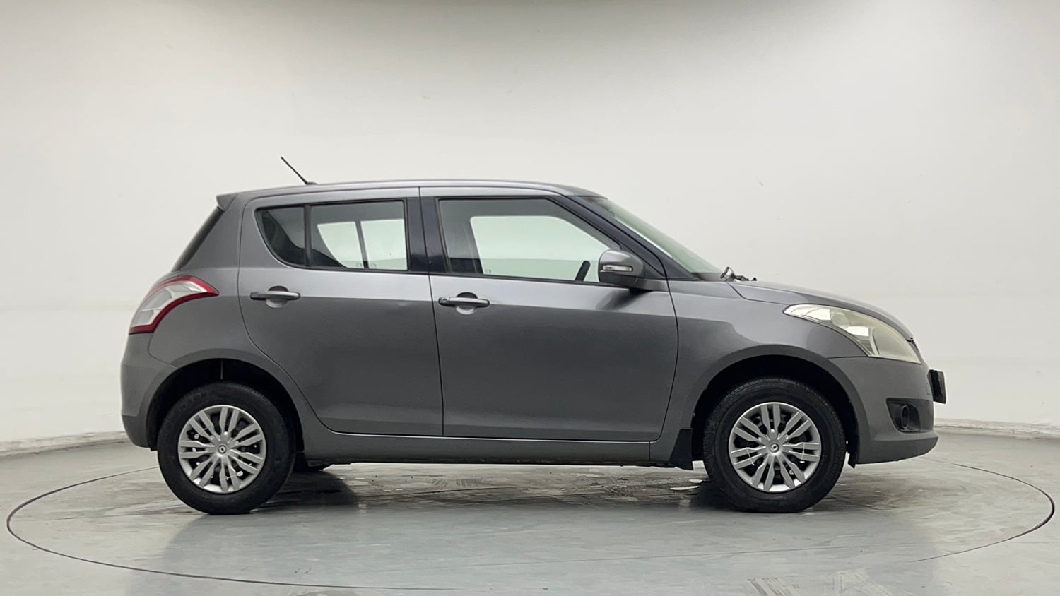 Used 2014 Maruti Suzuki Swift VXi Petrol Manual exterior RIGHT SIDE VIEW