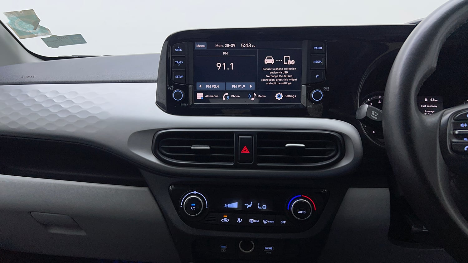 Used 2023 Hyundai Grand i10 Nios Sportz 1.2 Kappa VTVT Petrol Manual top_features Integrated (in-dash) music system