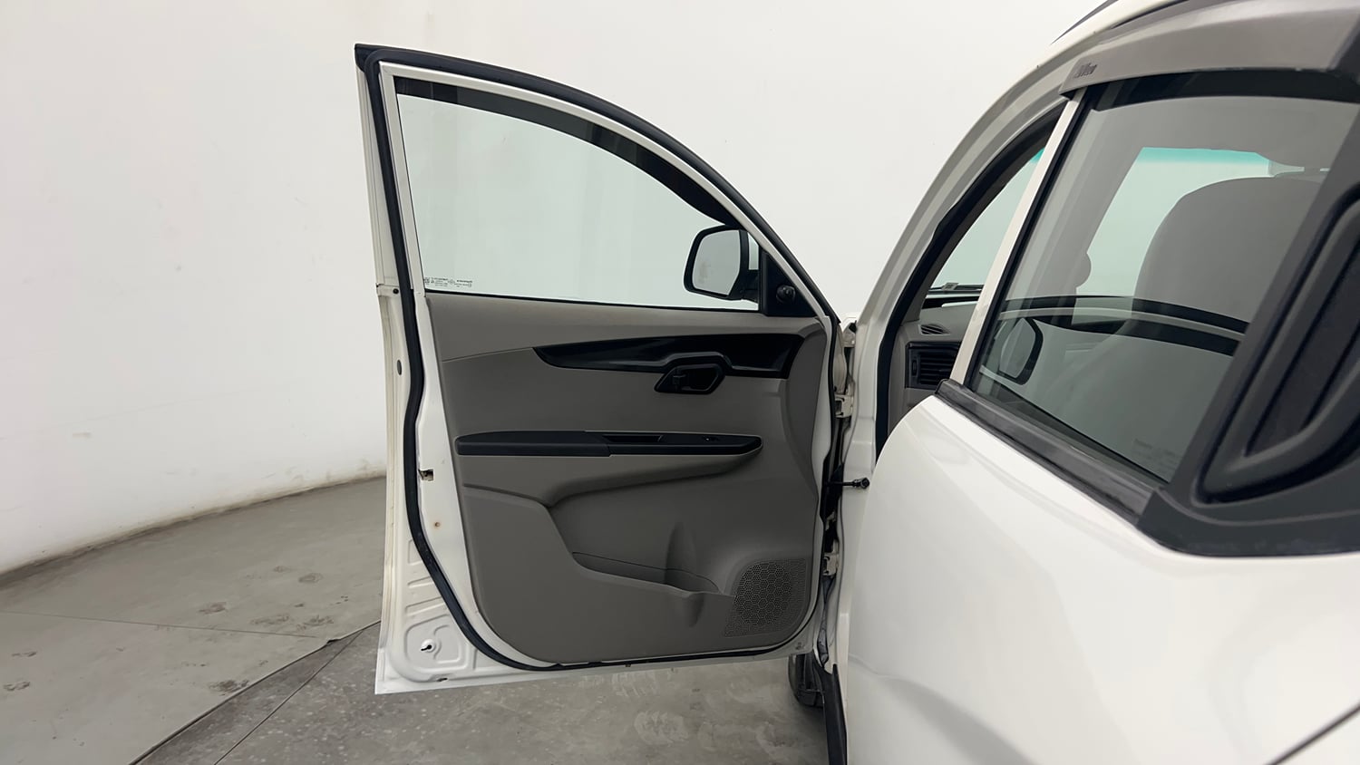 Used 2016 Mahindra KUV100 K4 6 STR Petrol Manual interior LEFT FRONT DOOR OPEN VIEW