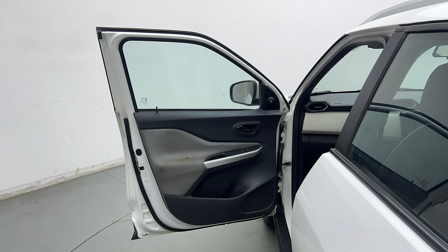 Used 2023 Nissan Magnite XE Petrol Manual interior LEFT FRONT DOOR OPEN VIEW