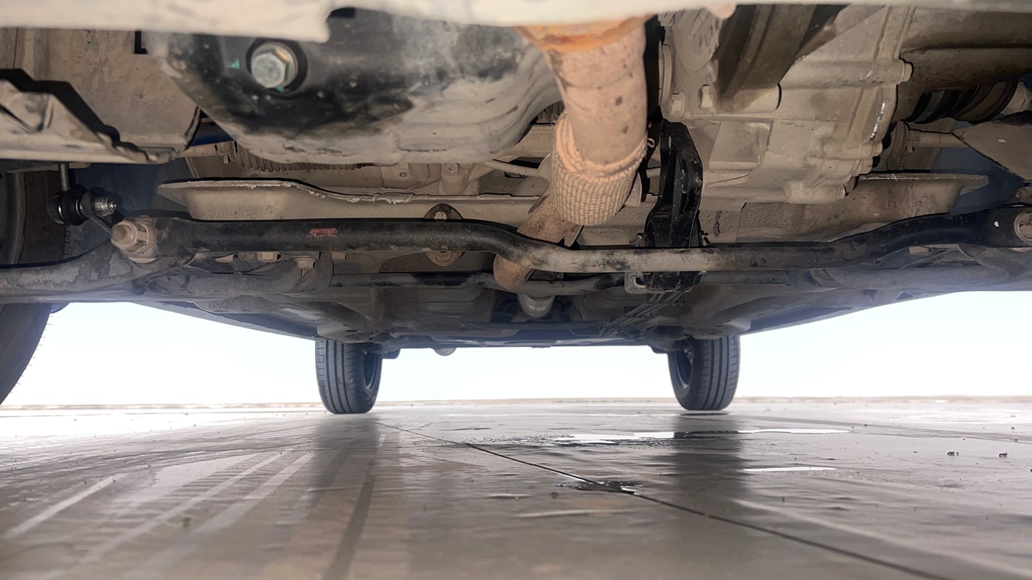 Used 2018 Tata Tiago Revotron XT Petrol Manual extra FRONT LEFT UNDERBODY VIEW