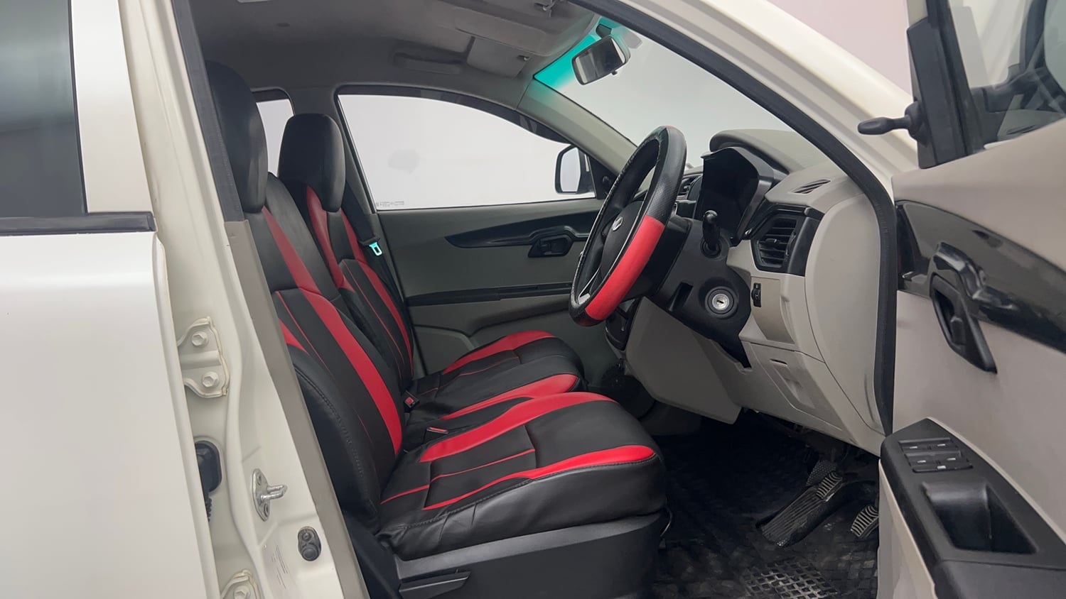 Used 2016 Mahindra KUV100 K4 6 STR Petrol Manual interior RIGHT SIDE FRONT DOOR CABIN VIEW