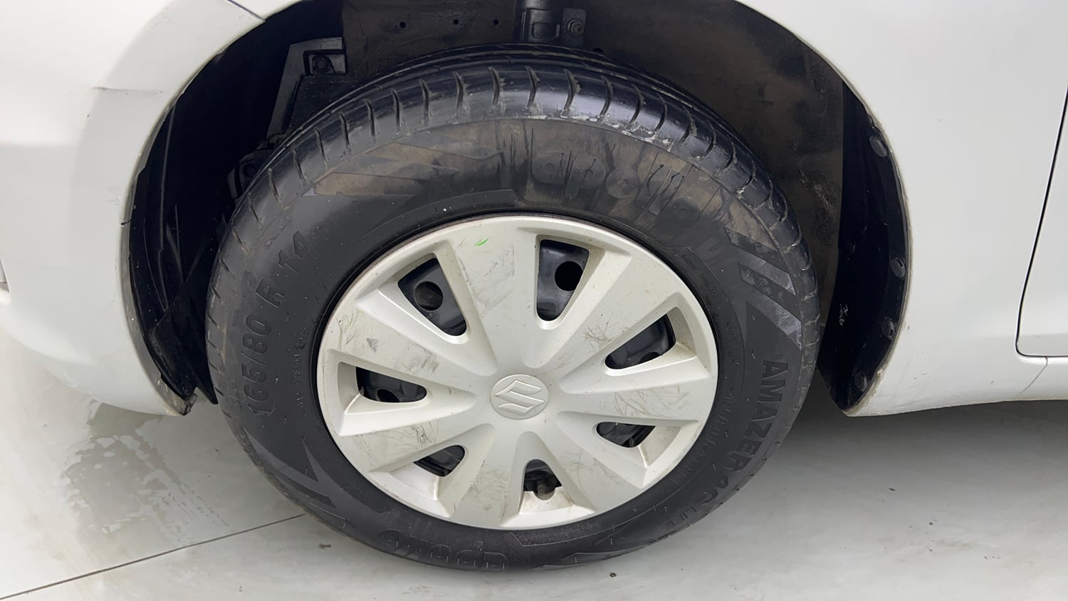 Used 2015 Maruti Suzuki Swift VXi Petrol Manual tyres LEFT FRONT TYRE RIM VIEW