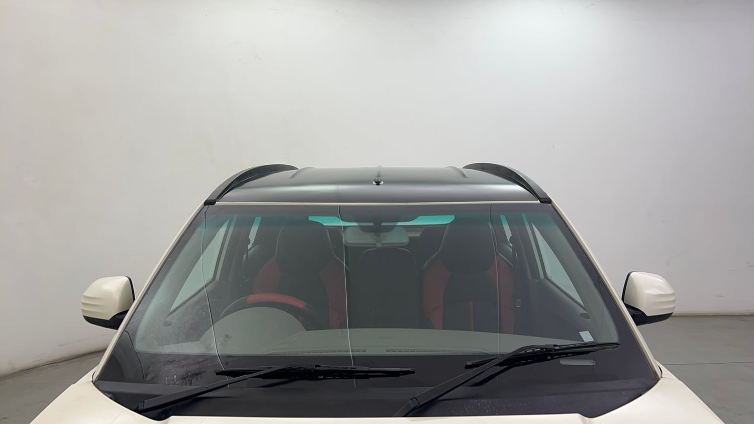 Used 2016 Mahindra KUV100 K4 6 STR Petrol Manual exterior FRONT WINDSHIELD VIEW