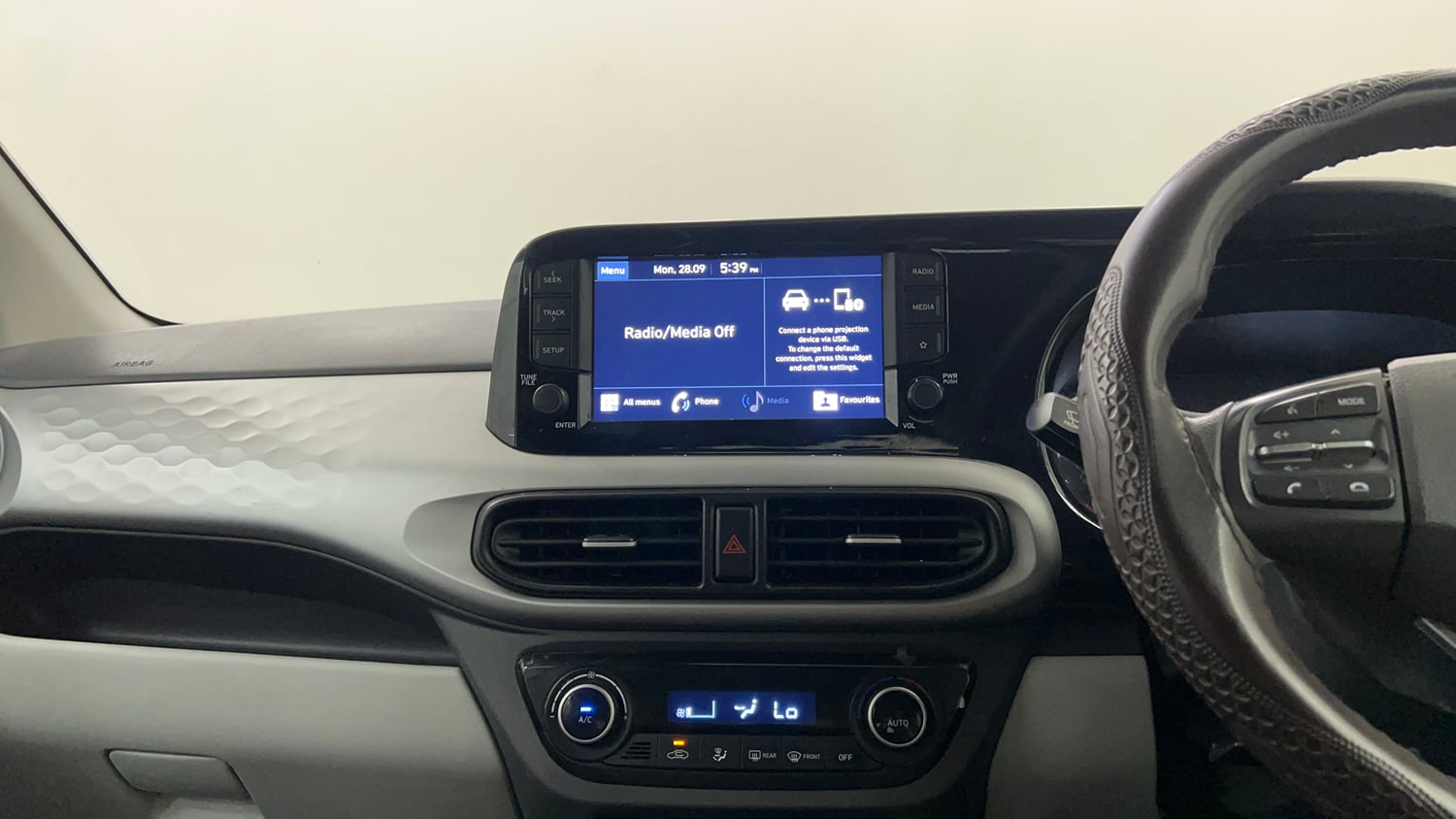 Used 2022 Hyundai Grand i10 Nios Sportz 1.2 Kappa VTVT Petrol Manual interior MUSIC SYSTEM & AC CONTROL VIEW