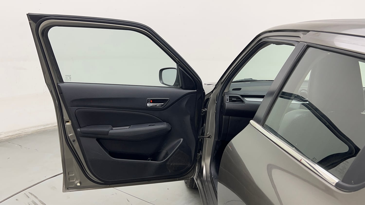Used 2022 Maruti Suzuki Swift VXi Petrol Manual interior LEFT FRONT DOOR OPEN VIEW