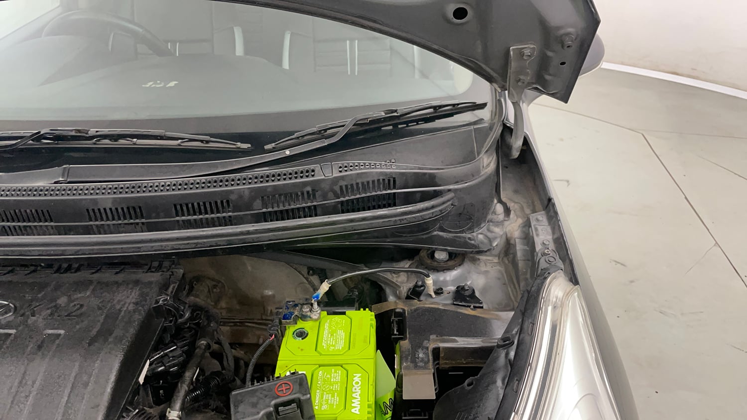 Used 2017 Hyundai Grand i10 Sportz (O) 1.2 Kappa VTVT Petrol Manual engine ENGINE LEFT SIDE HINGE & APRON VIEW
