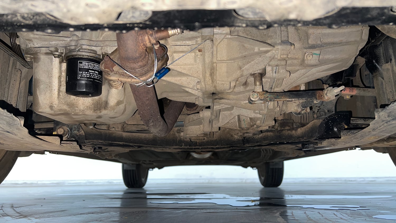 Used 2021 Maruti Suzuki Baleno Zeta Petrol Manual extra FRONT LEFT UNDERBODY VIEW