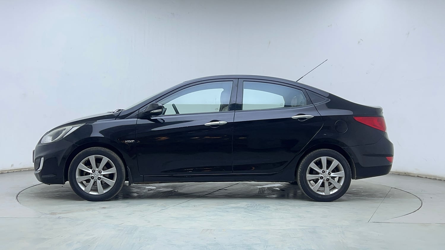 Used 2013 Hyundai Verna Fluidic 1.6 VTVT SX Petrol Manual exterior LEFT SIDE VIEW