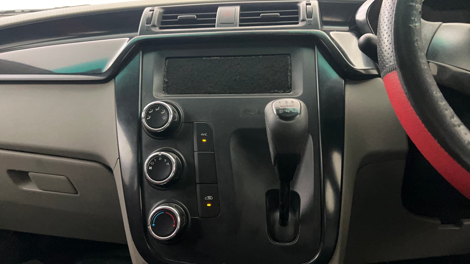 Used 2016 Mahindra KUV100 K4 6 STR Petrol Manual interior MUSIC SYSTEM & AC CONTROL VIEW