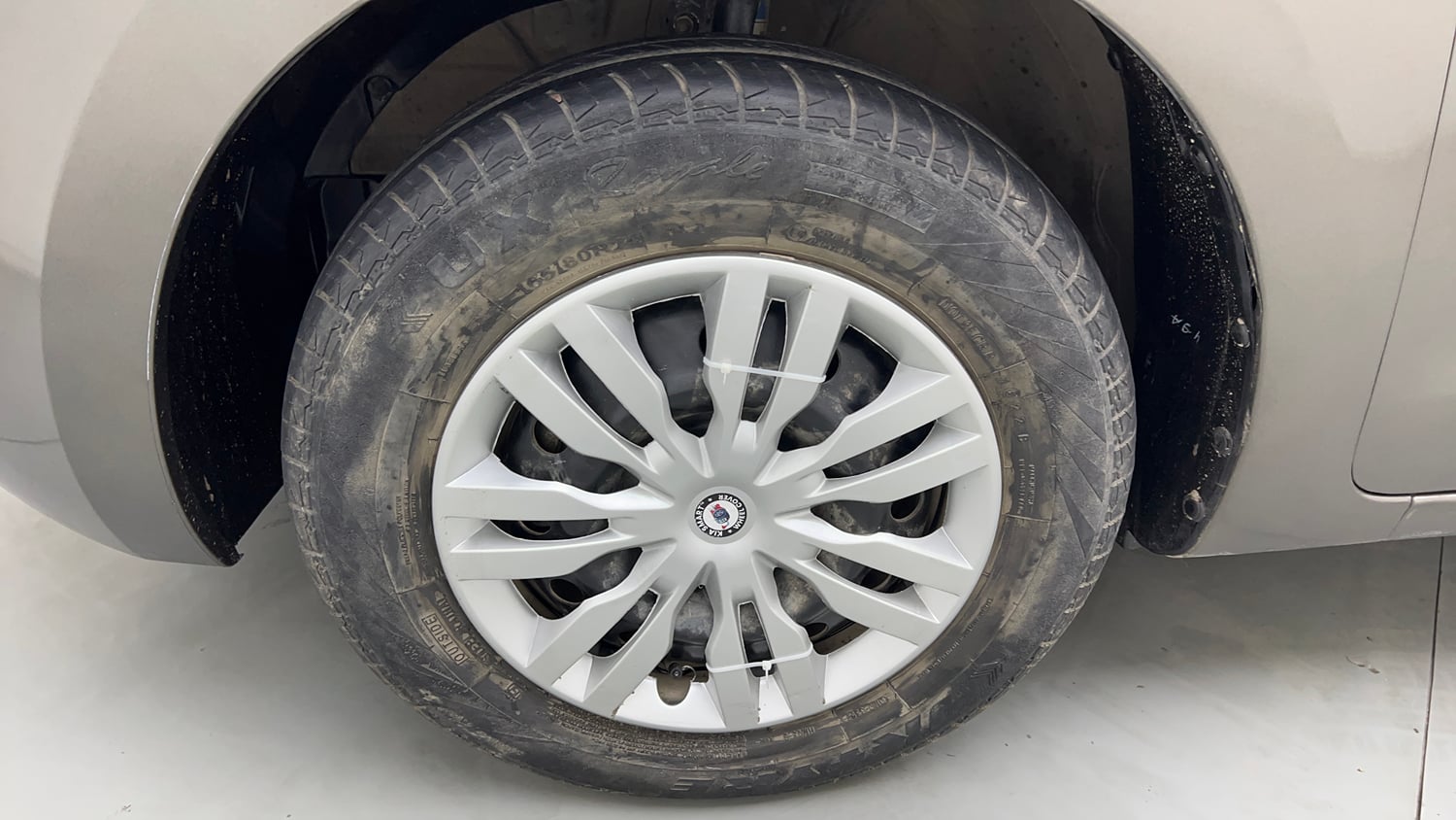Used 2022 Maruti Suzuki Swift VXi Petrol Manual tyres LEFT FRONT TYRE RIM VIEW