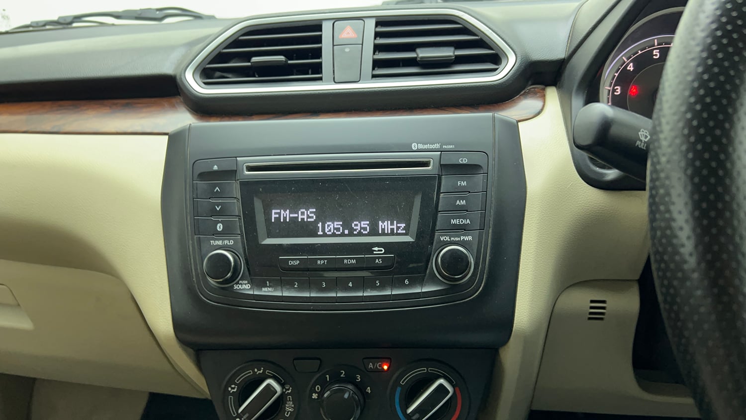 Used 2017 Maruti Suzuki Dzire VXi Petrol Manual top_features Integrated (in-dash) music system