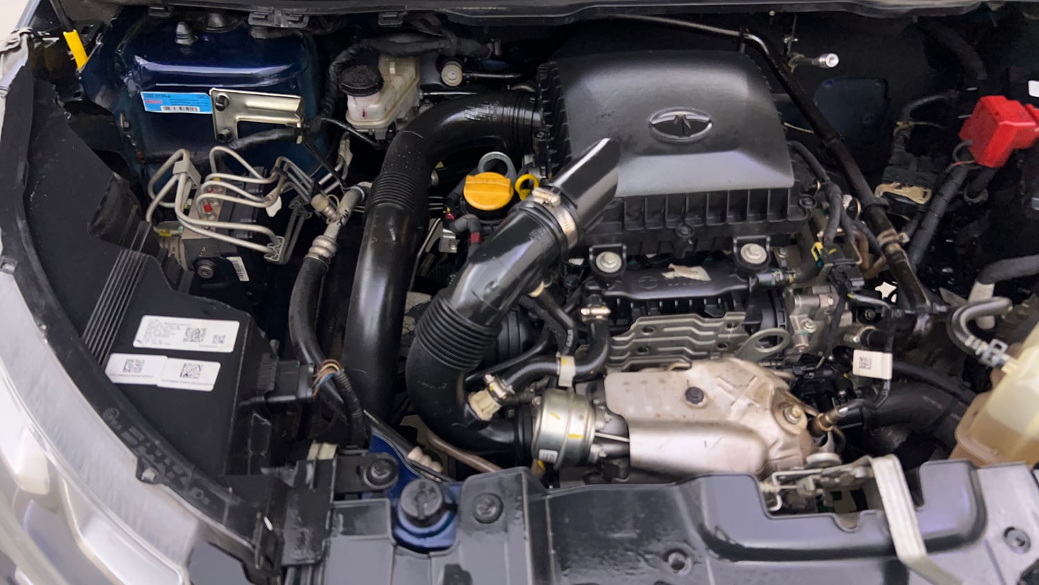 Used 2023 Tata Nexon XZ Plus LUXS Dual Tone Petrol Manual engine ENGINE RIGHT SIDE VIEW