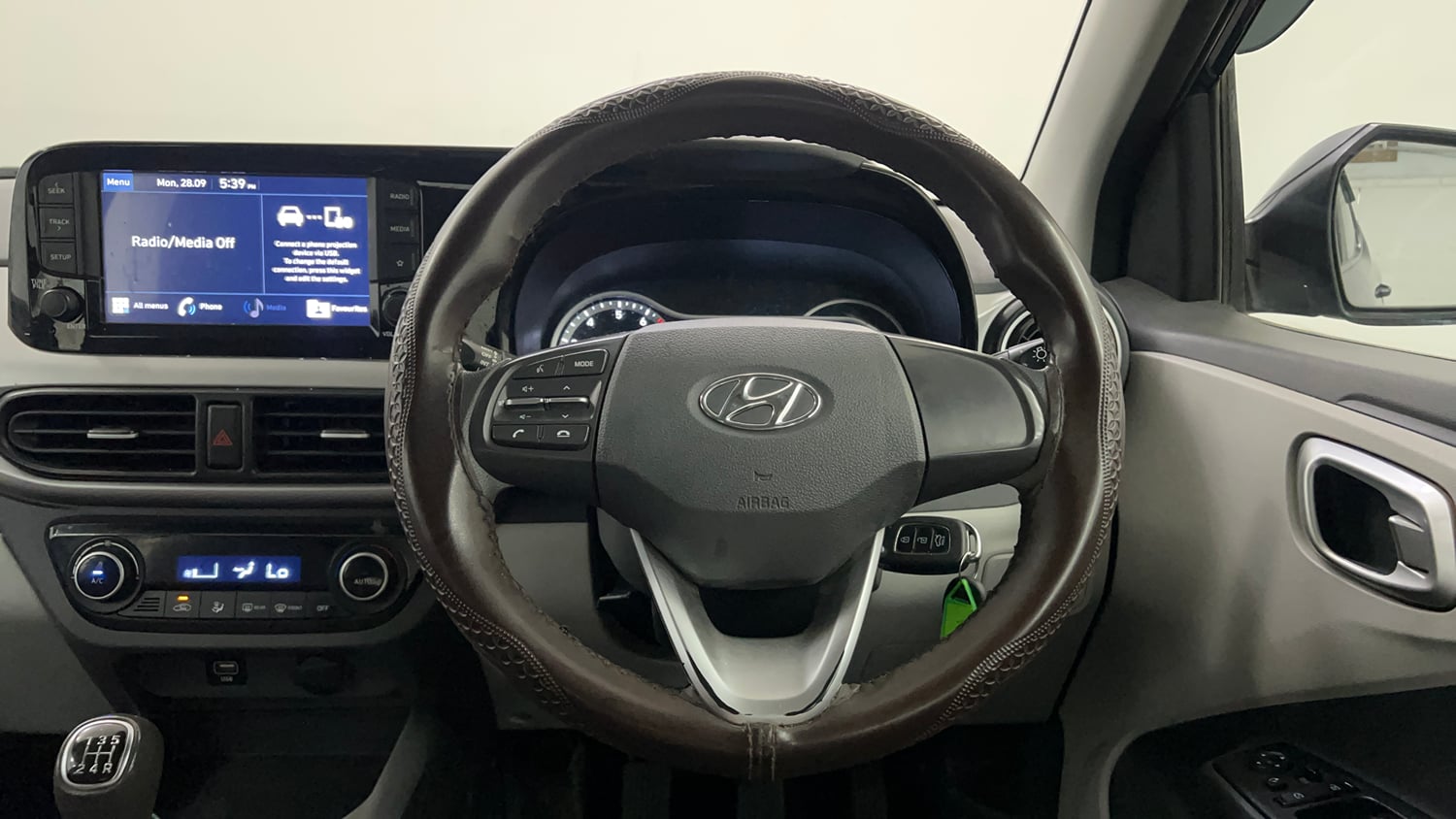 Used 2022 Hyundai Grand i10 Nios Sportz 1.2 Kappa VTVT Petrol Manual interior STEERING VIEW