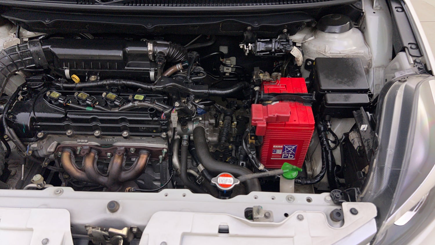Used 2021 Toyota Glanza V CVT Petrol Automatic engine ENGINE LEFT SIDE VIEW