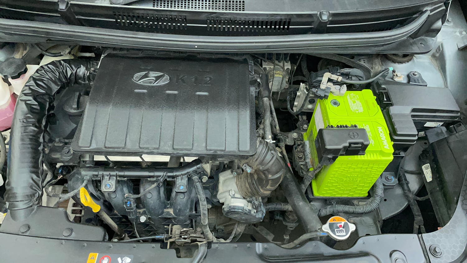 Used 2021 Hyundai Grand i10 Nios Magna 1.2 Kappa VTVT Petrol Manual engine ENGINE LEFT SIDE VIEW