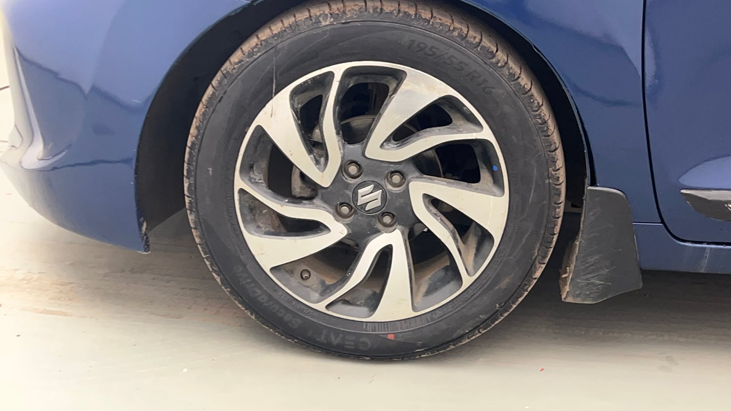 Used 2019 Maruti Suzuki Baleno Zeta 1.2 Petrol Manual tyres LEFT FRONT TYRE RIM VIEW