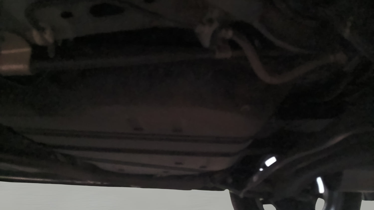 Used 2024 Maruti Suzuki XL6 Zeta MT Petrol Petrol Manual extra REAR UNDERBODY VIEW (TAKEN FROM REAR)