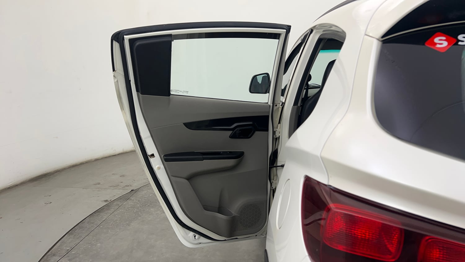 Used 2016 Mahindra KUV100 K4 6 STR Petrol Manual interior LEFT REAR DOOR OPEN VIEW