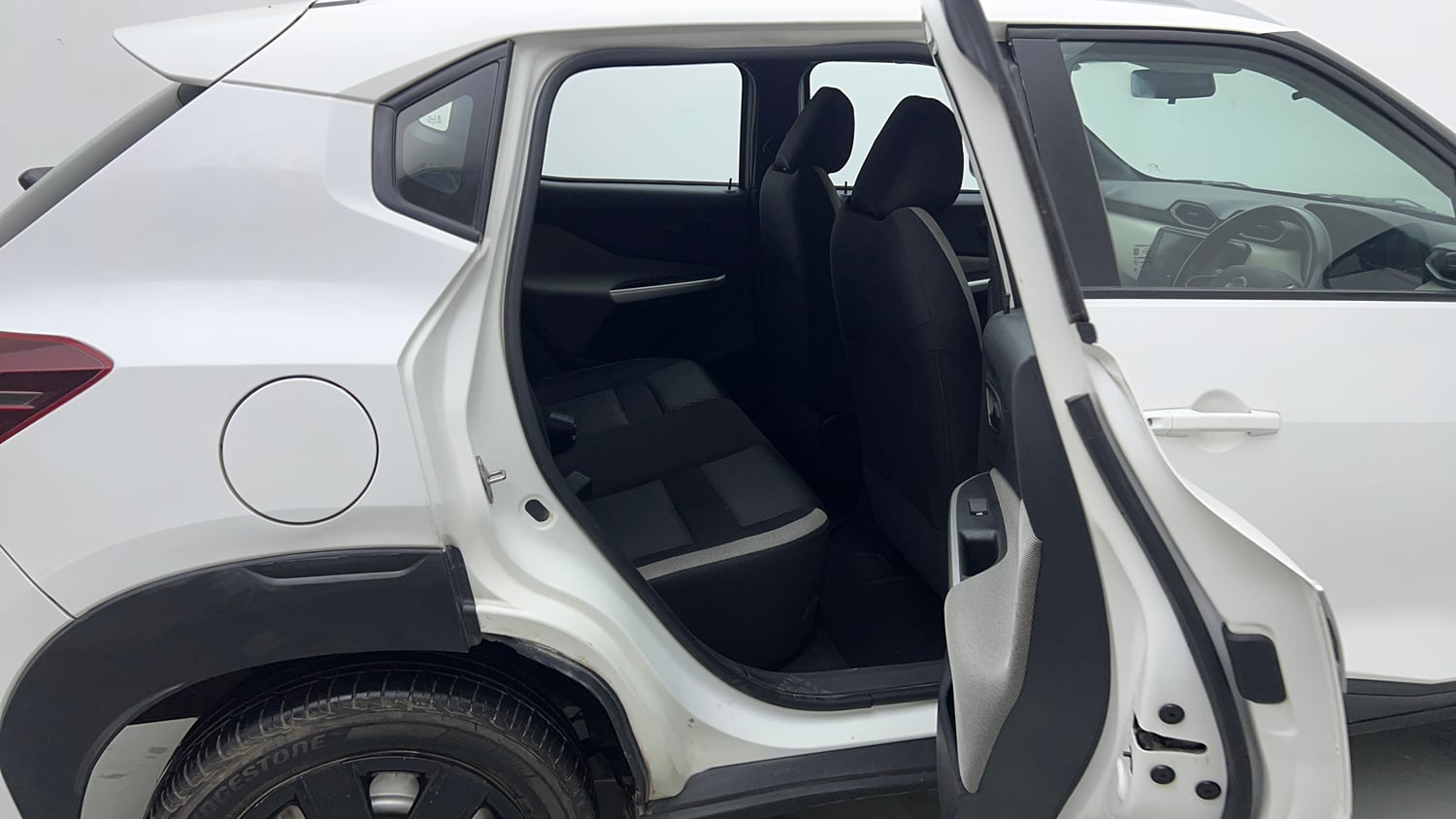 Used 2023 Nissan Magnite XE Petrol Manual interior RIGHT SIDE REAR DOOR CABIN VIEW