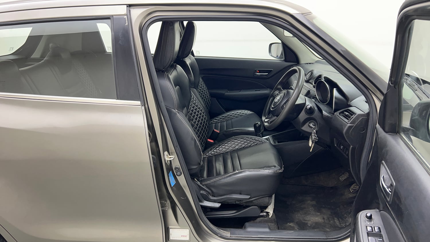 Used 2022 Maruti Suzuki Swift VXi Petrol Manual interior RIGHT SIDE FRONT DOOR CABIN VIEW