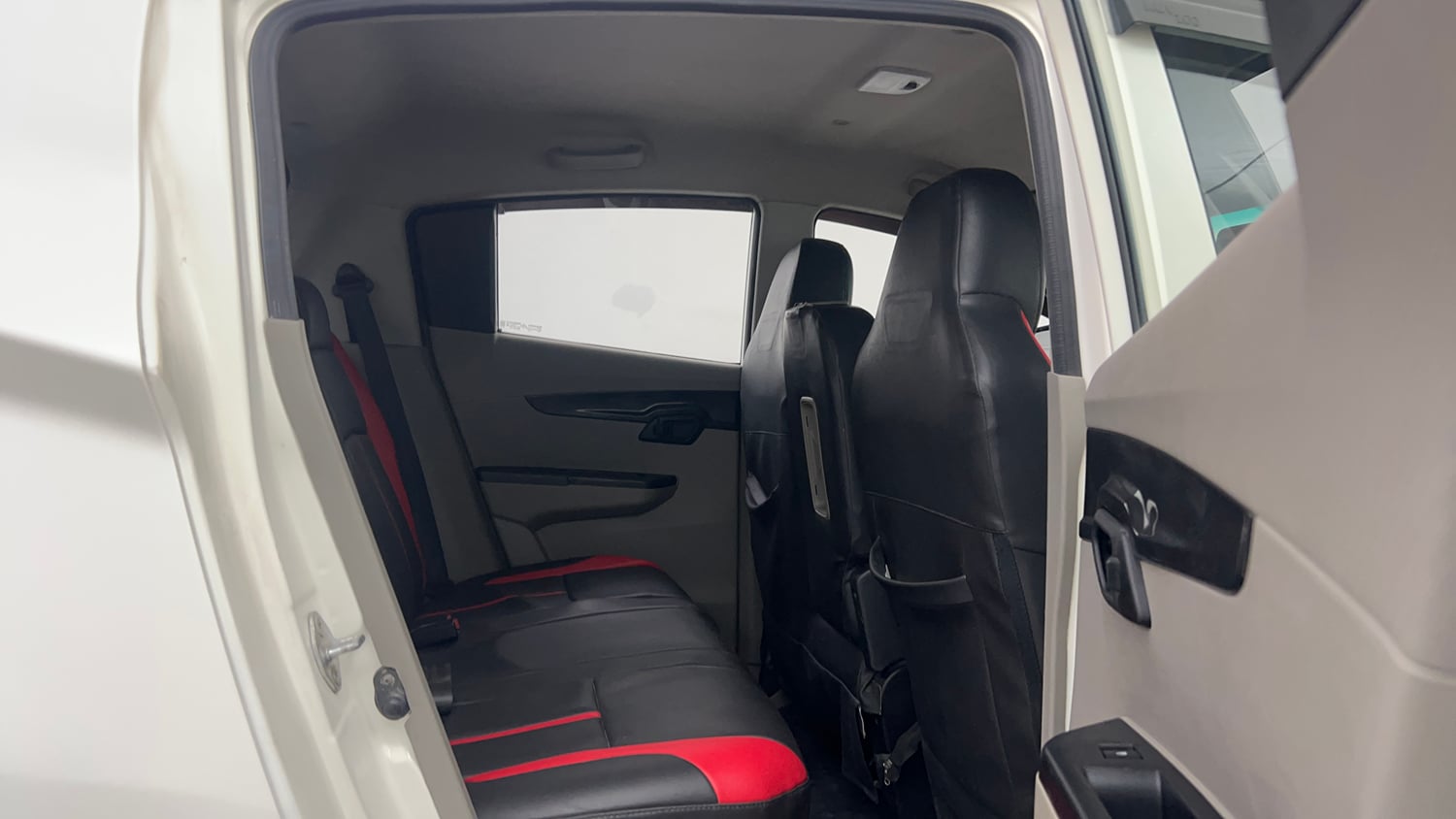 Used 2016 Mahindra KUV100 K4 6 STR Petrol Manual interior RIGHT SIDE REAR DOOR CABIN VIEW