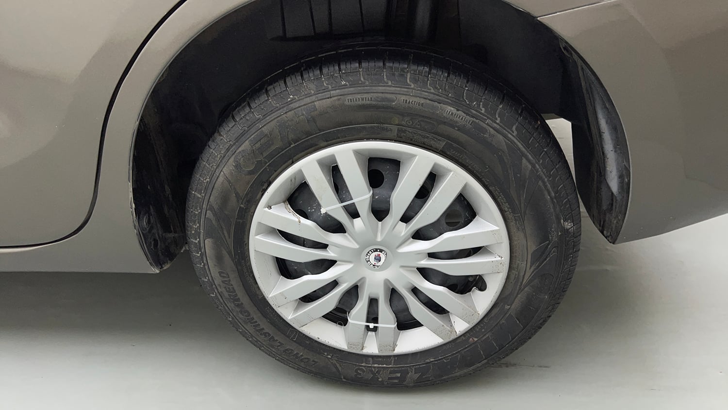 Used 2017 Maruti Suzuki Dzire VXi AMT Petrol Automatic tyres LEFT REAR TYRE RIM VIEW