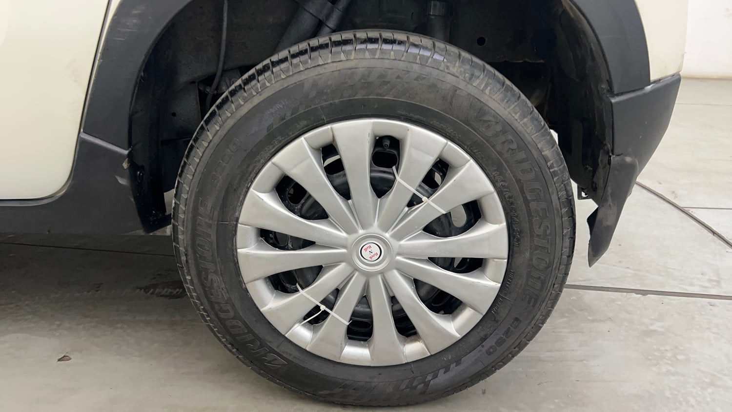 Used 2016 Mahindra KUV100 K4 6 STR Petrol Manual tyres LEFT REAR TYRE RIM VIEW