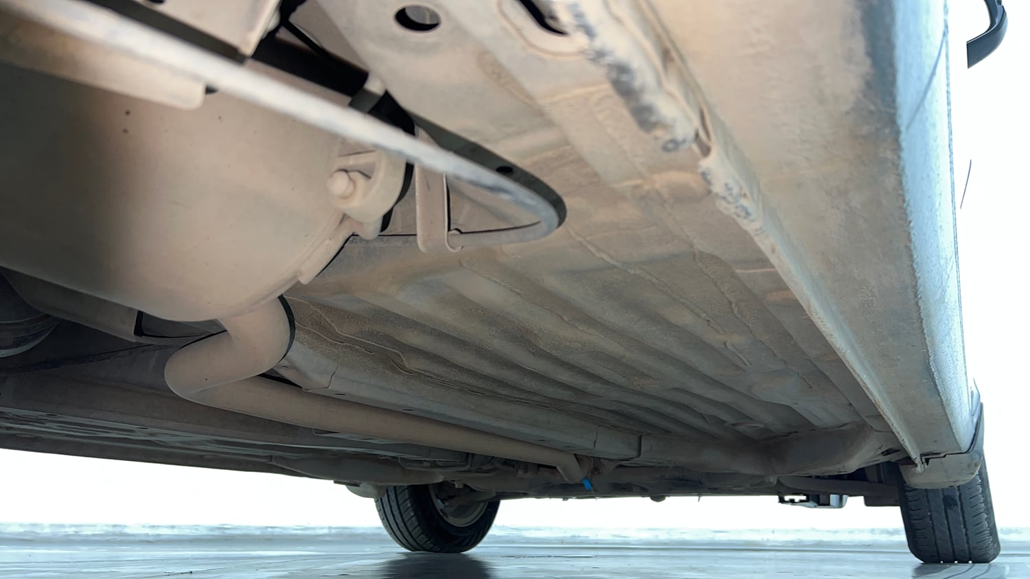 Used 2023 Honda Amaze VX 1.2 Petrol CVT Petrol Automatic extra REAR RIGHT UNDERBODY VIEW