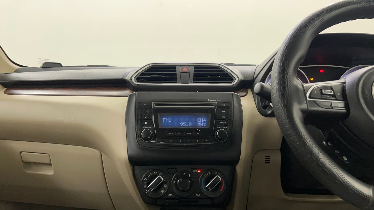 Used 2019 Maruti Suzuki Dzire VXi Petrol Manual interior MUSIC SYSTEM & AC CONTROL VIEW