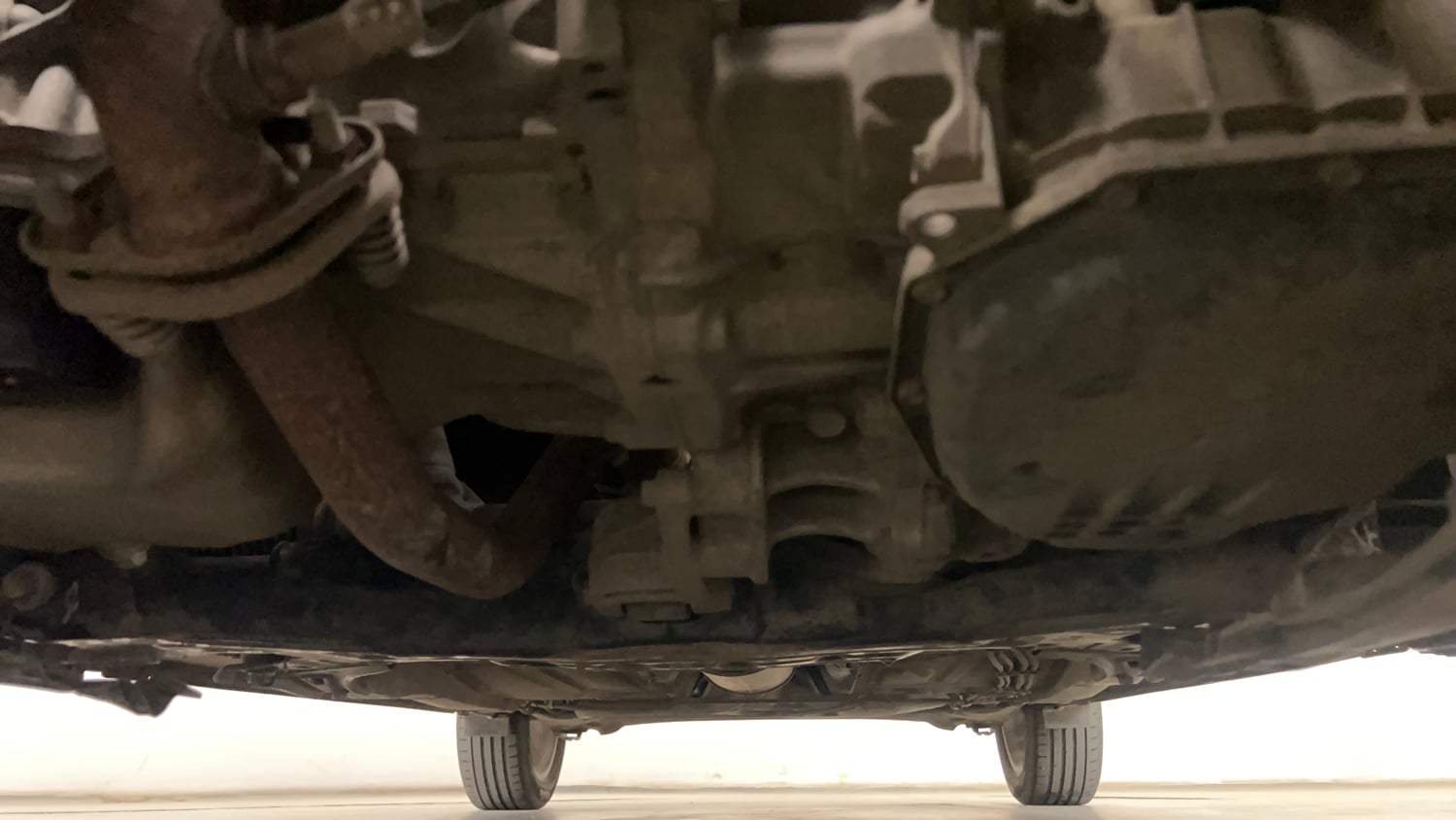 Used 2019 Maruti Suzuki Baleno Zeta Automatic Petrol Automatic extra FRONT LEFT UNDERBODY VIEW
