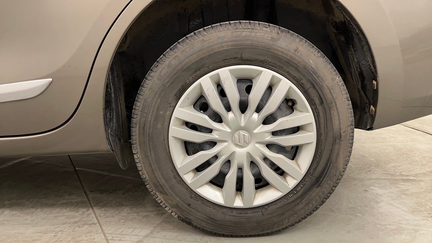 Used 2019 Maruti Suzuki Dzire VXi Petrol Manual tyres LEFT REAR TYRE RIM VIEW