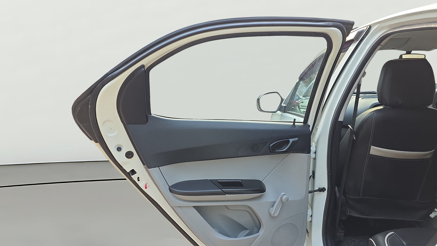 Used 2020 Tata Tiago XE Petrol Manual interior LEFT REAR DOOR OPEN VIEW