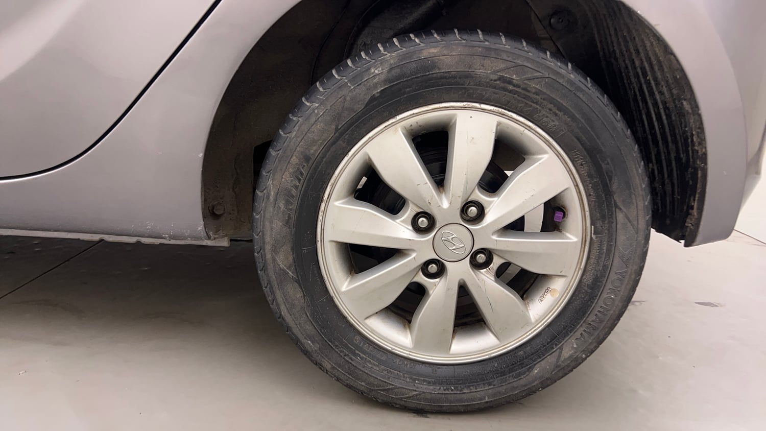 Used 2014 Hyundai i20 Sportz 1.2 Petrol Manual tyres LEFT REAR TYRE RIM VIEW