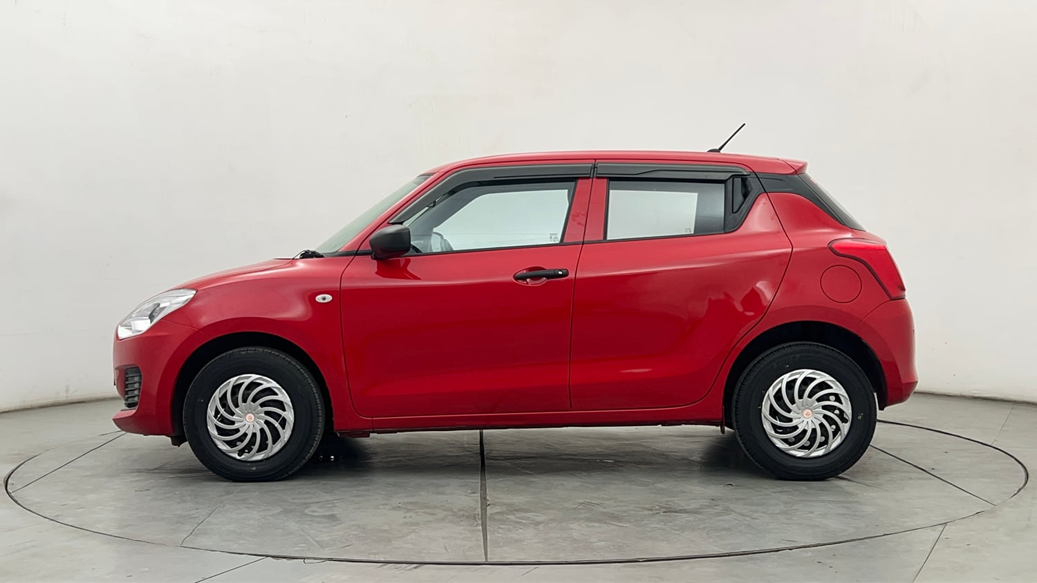 Used 2020 Maruti Suzuki Swift LXi Petrol Manual exterior LEFT SIDE VIEW