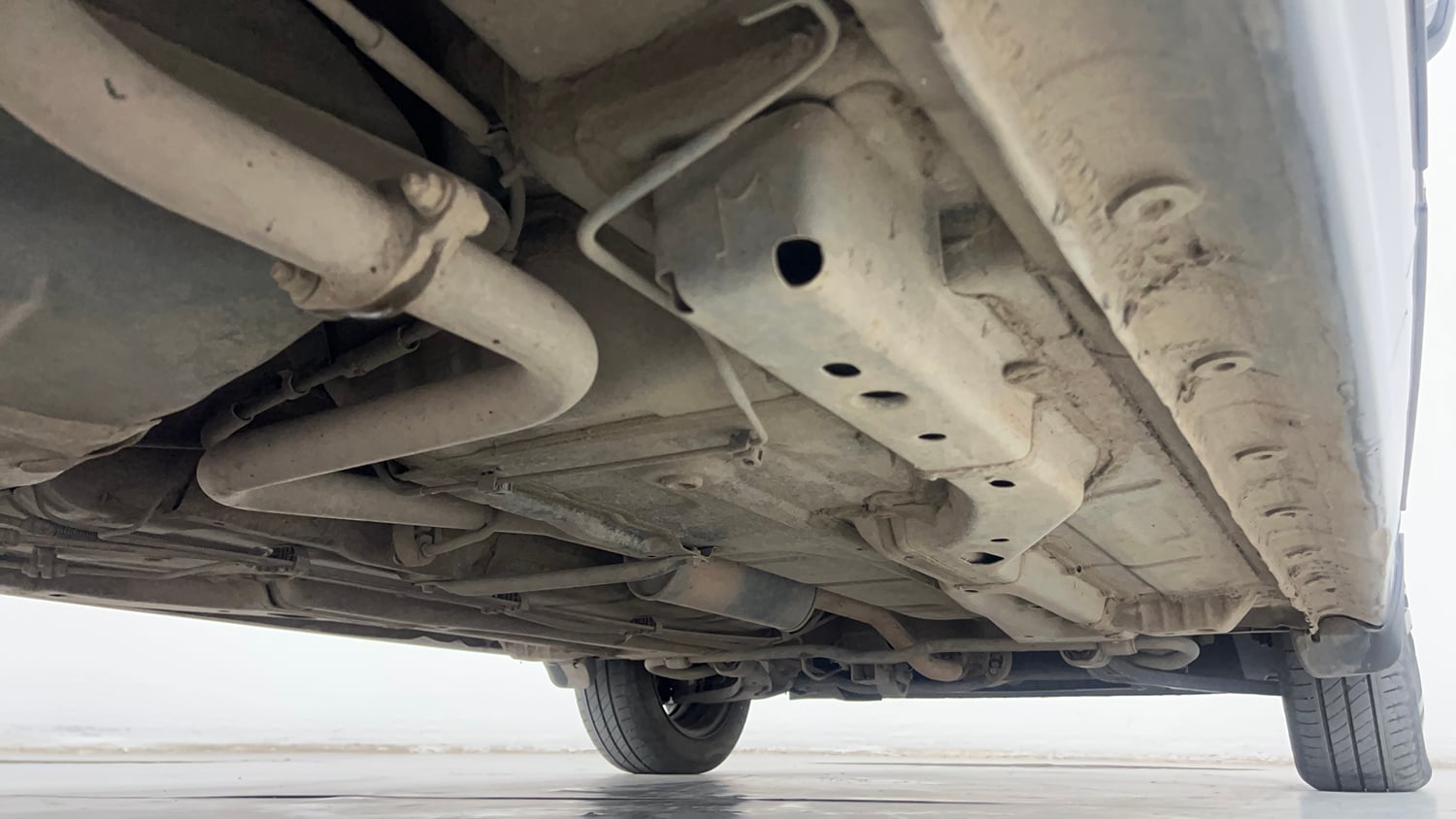 Used 2024 Tata Tigor XZA Plus iCNG Cng Automatic extra REAR RIGHT UNDERBODY VIEW
