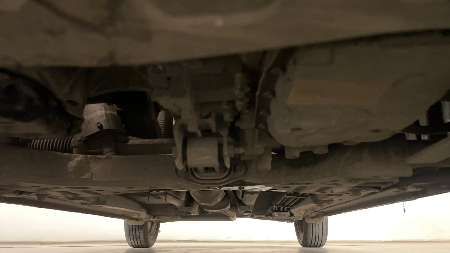 Used 2023 Hyundai New i20 Asta (O) 1.2 IVT Petrol Automatic extra FRONT LEFT UNDERBODY VIEW