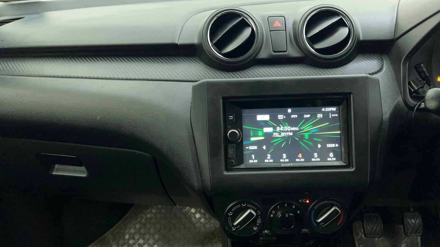 Used 2018 Maruti Suzuki Swift LXi Petrol Manual interior MUSIC SYSTEM & AC CONTROL VIEW