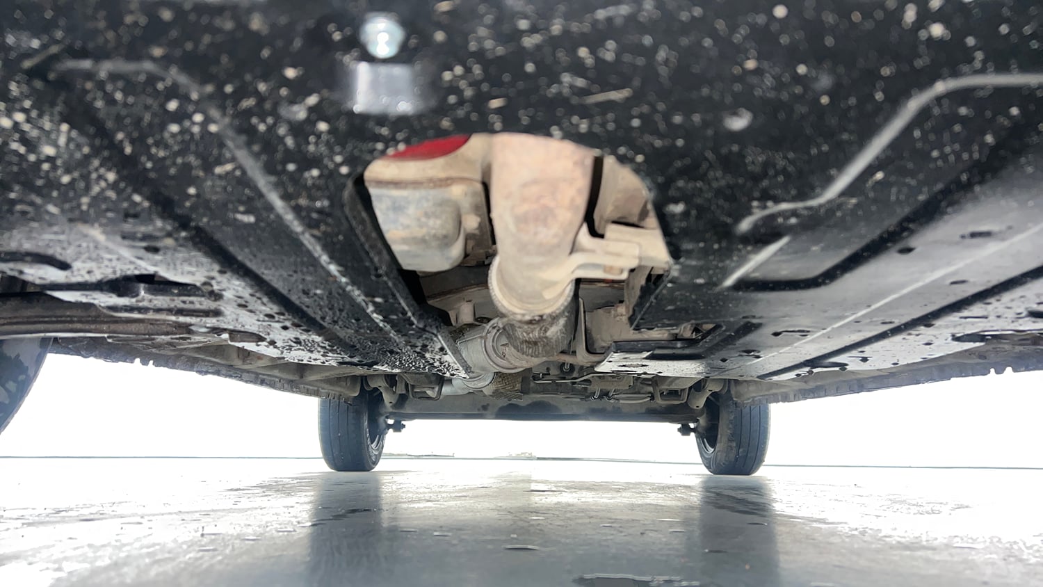 Used 2019 Mahindra KUV100 NXT K4 Plus 6 STR Petrol Manual extra FRONT LEFT UNDERBODY VIEW