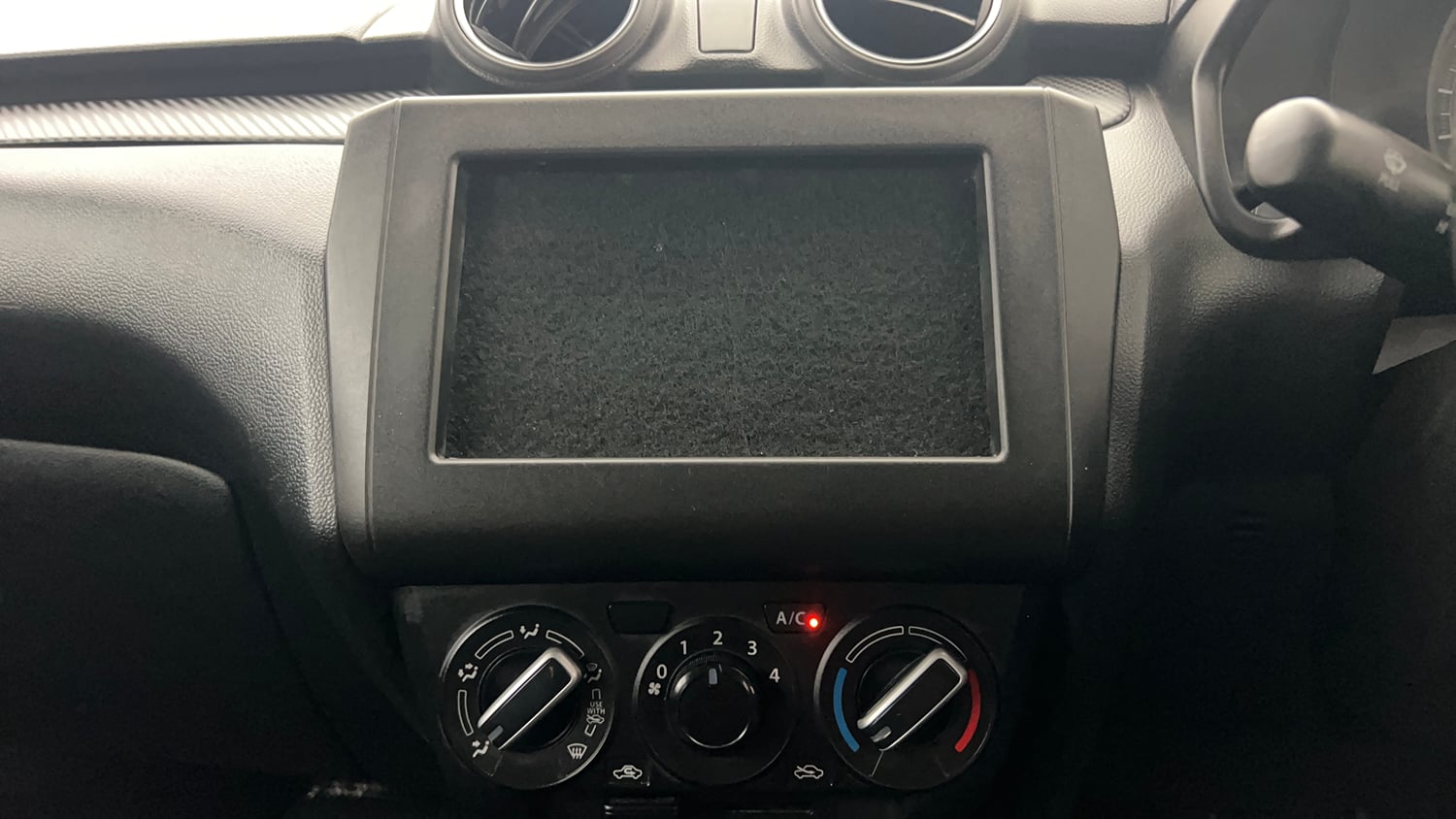 Used 2020 Maruti Suzuki Swift LXi Petrol Manual interior MUSIC SYSTEM & AC CONTROL VIEW