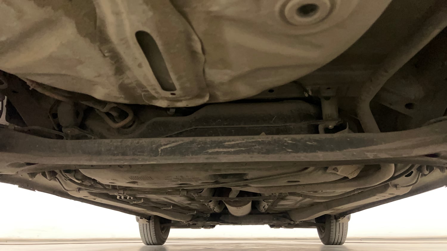 Used 2019 Maruti Suzuki Dzire VXi Petrol Manual extra REAR UNDERBODY VIEW (TAKEN FROM REAR)