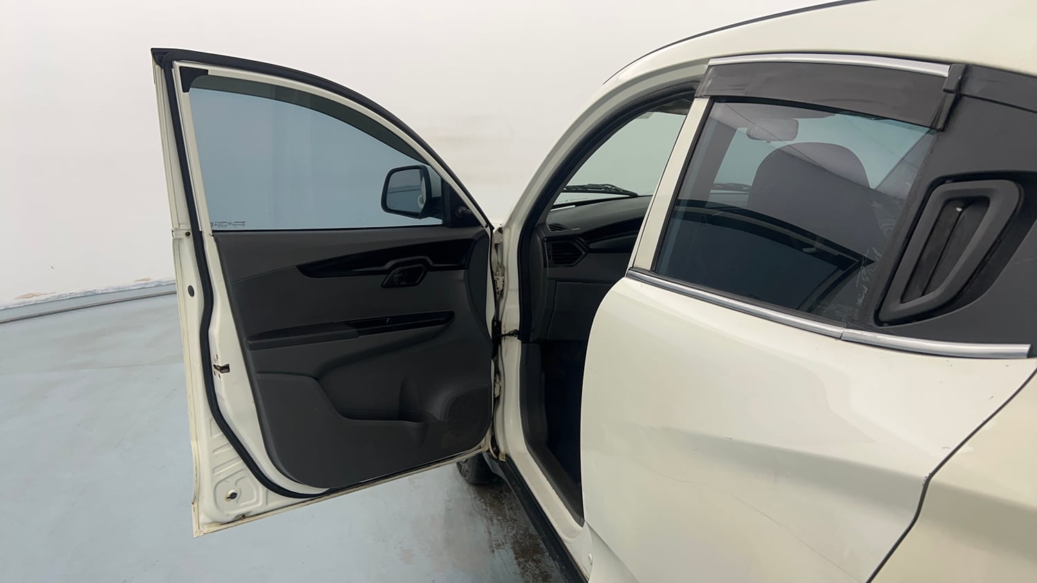 Used 2019 Mahindra KUV100 NXT K4 Plus 6 STR Petrol Manual interior LEFT FRONT DOOR OPEN VIEW