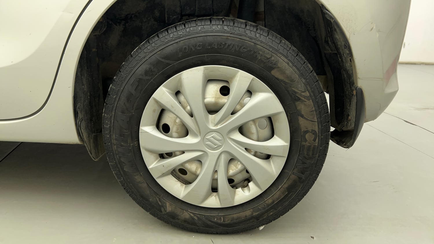 Used 2018 Maruti Suzuki Swift LXi Petrol Manual tyres LEFT REAR TYRE RIM VIEW