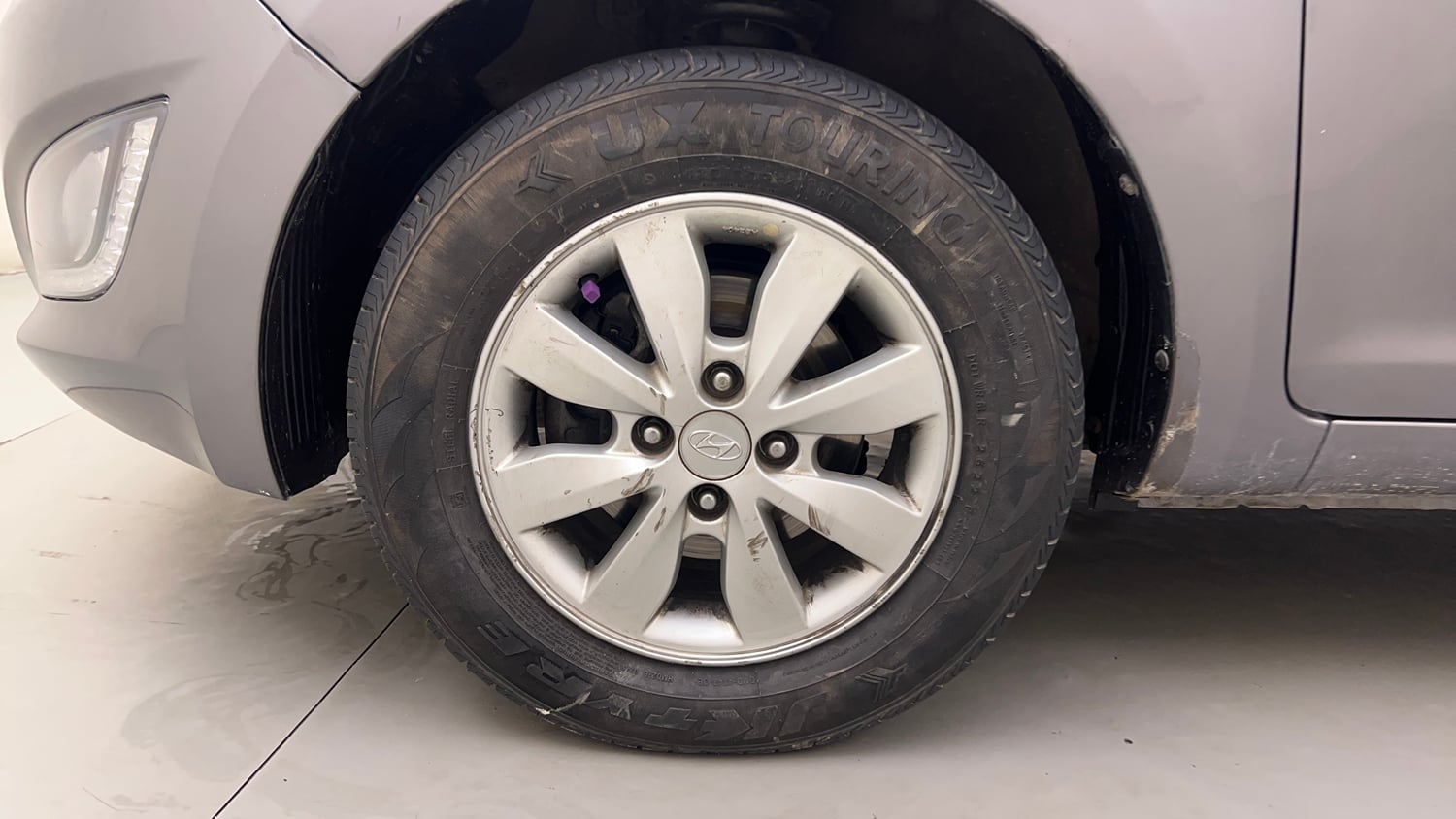 Used 2014 Hyundai i20 Sportz 1.2 Petrol Manual tyres LEFT FRONT TYRE RIM VIEW