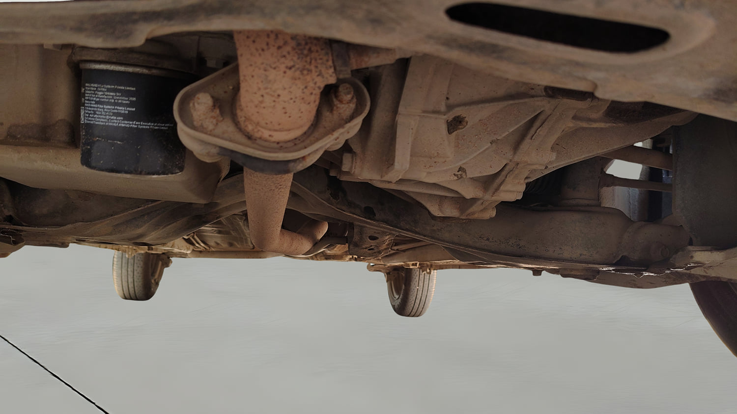 Used 2017 Maruti Suzuki Celerio VXi AMT Petrol Automatic extra FRONT LEFT UNDERBODY VIEW