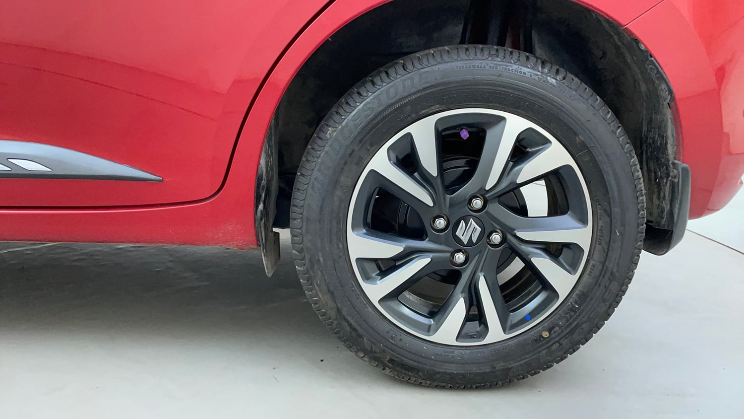 Used 2024 Maruti Suzuki Swift ZXi Plus Dual Tone AMT Petrol Automatic tyres LEFT REAR TYRE RIM VIEW