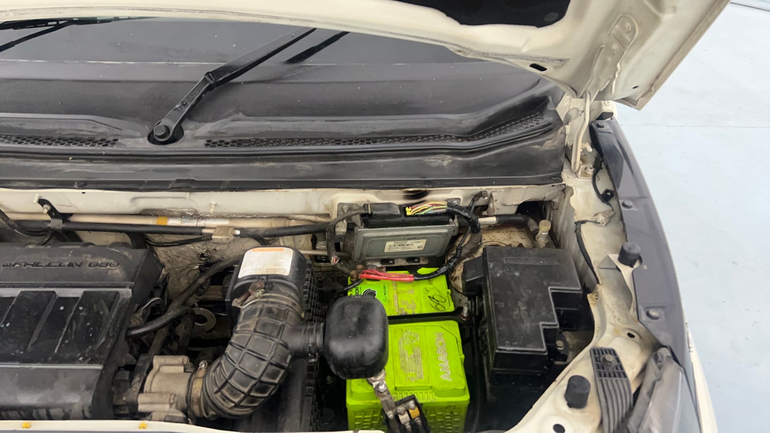 Used 2019 Mahindra KUV100 NXT K4 Plus 6 STR Petrol Manual engine ENGINE LEFT SIDE HINGE & APRON VIEW