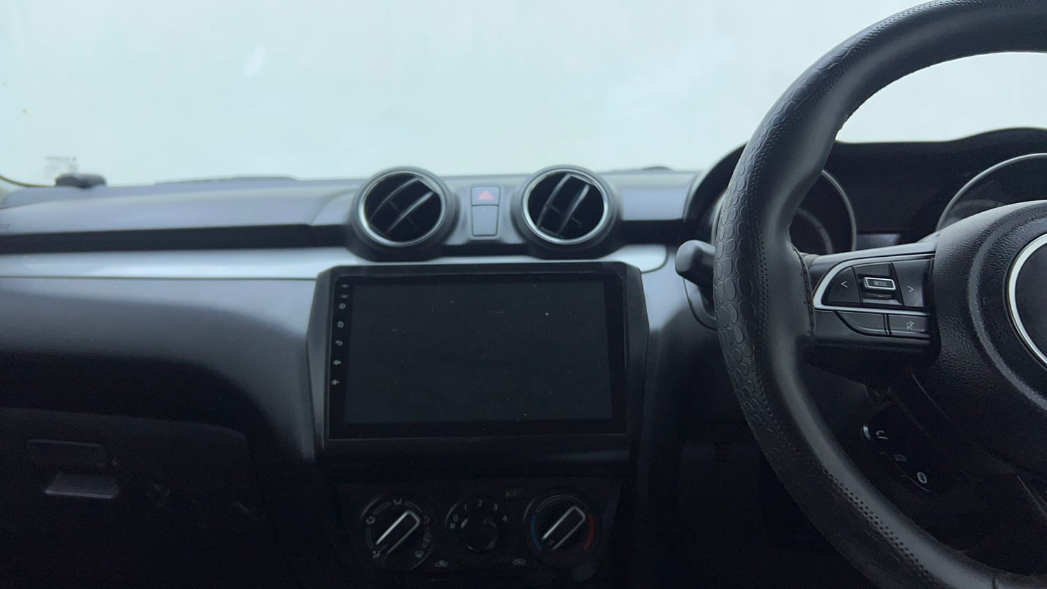 Used 2019 Maruti Suzuki Swift VXi Petrol Manual top_features Integrated (in-dash) music system