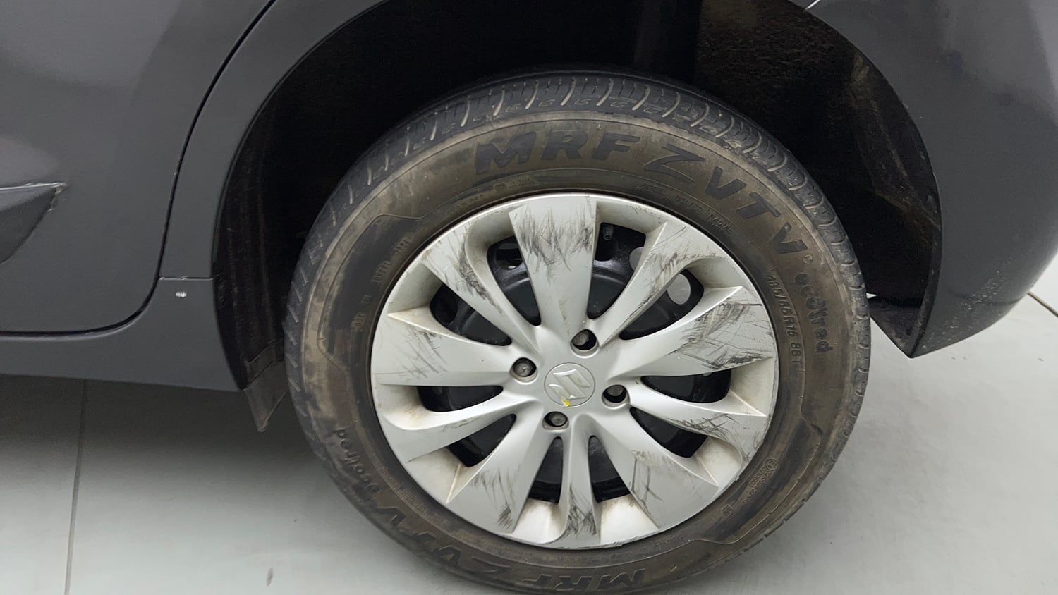 Used 2017 Maruti Suzuki Baleno Delta 1.2 Petrol Manual tyres LEFT REAR TYRE RIM VIEW